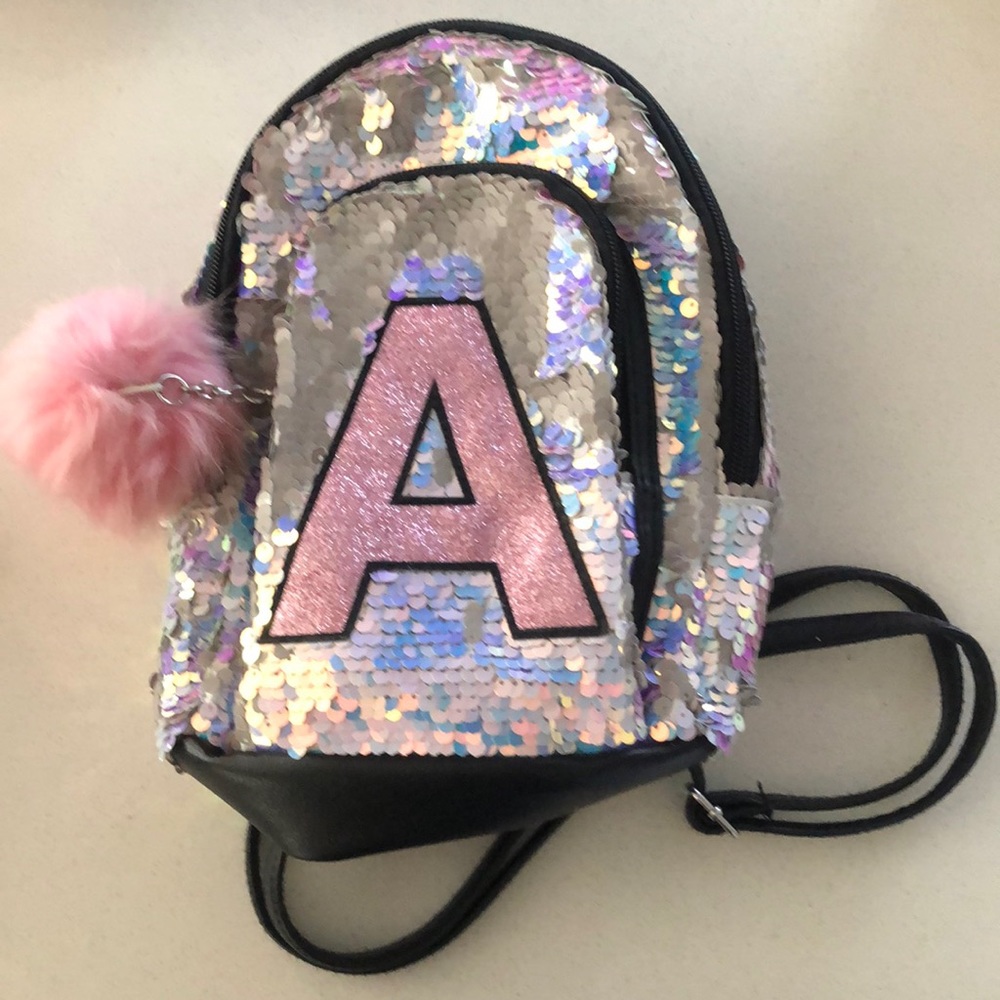 Justice mini backpack, near new condition